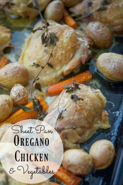 Sheet Pan Oregano Chicken & Vegetables made with bone-in chicken thighs, fresh oregano, baby potatoes and carrots is a deliciously simple weeknight meal.