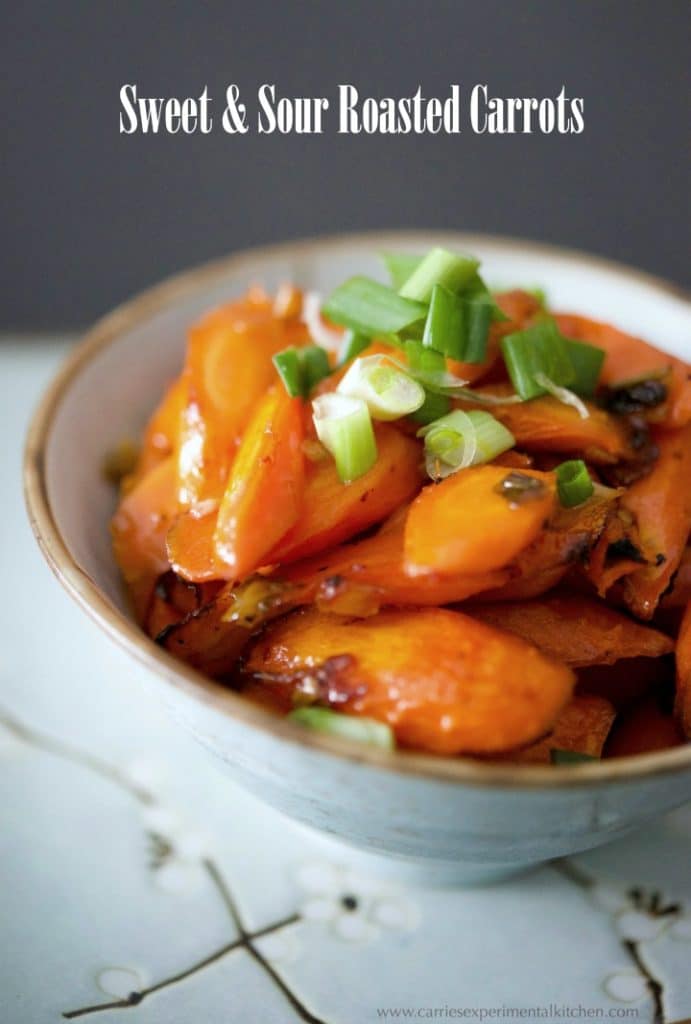  Sweet & Sour Roasted Carrots tossed in a mixture of sesame oil, garlic, chili paste, vinegar, salt and honey; then roasted until tender make the perfect side dish to any Asian inspired meal.