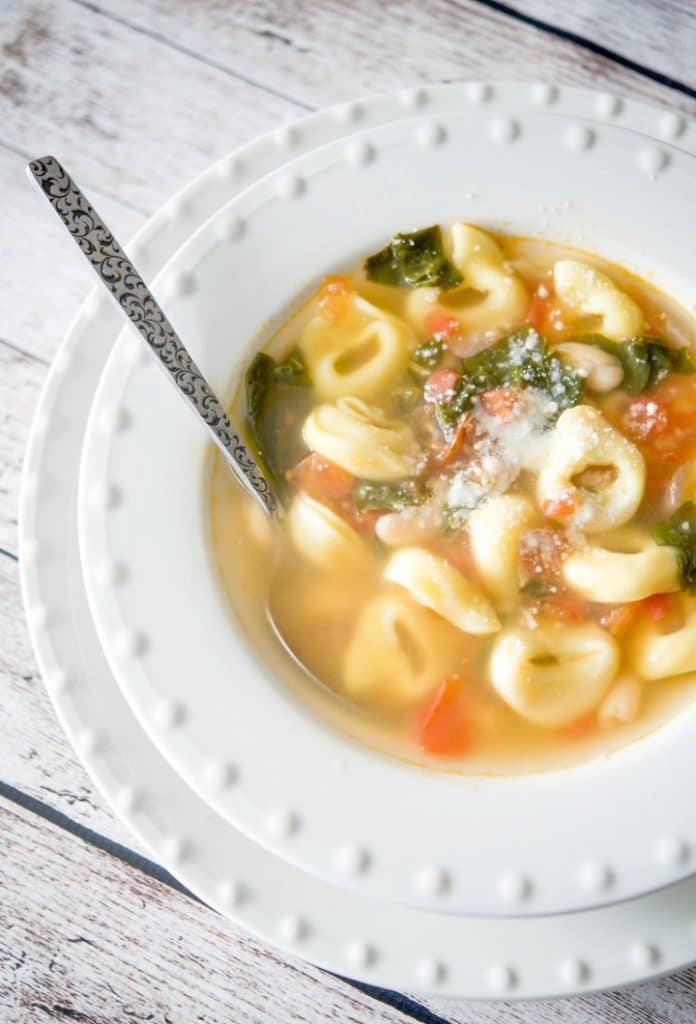 This vegetarian Tortellini Vegetable Soup made with cheese tortellini, Cannellini beans, plum tomatoes and spinach in a vegetable broth is hearty and delicious.