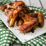 Guinness beer is the base of this delicious bbq sauce and adds a ton of flavor to these baked chicken wings. Tasty for weeknight dinner or weekend snacking!