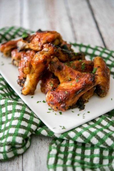 Guinness beer is the base of this delicious bbq sauce and adds a ton of flavor to these baked chicken wings. Tasty for weeknight dinner or weekend snacking!