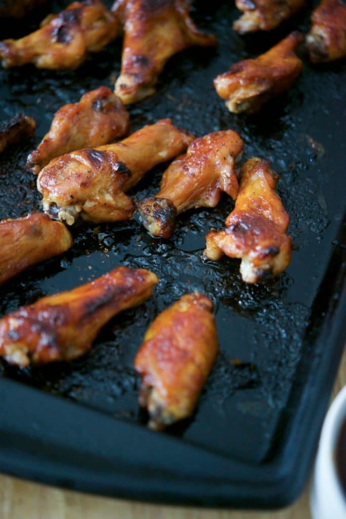 Guinness BBQ Baked Chicken Wings on a slate.