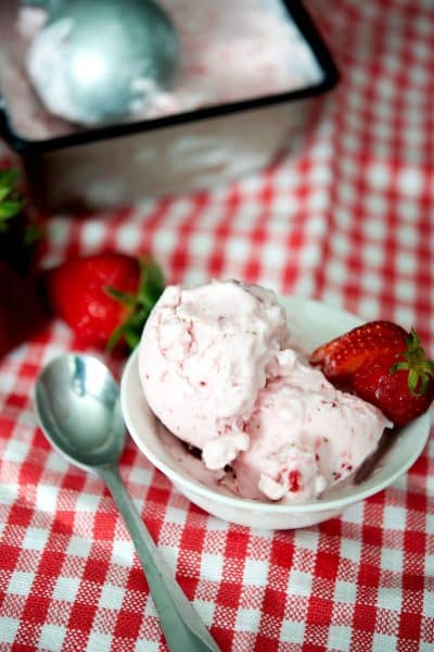 Strawberry frozen yogurt in a small bowl.
