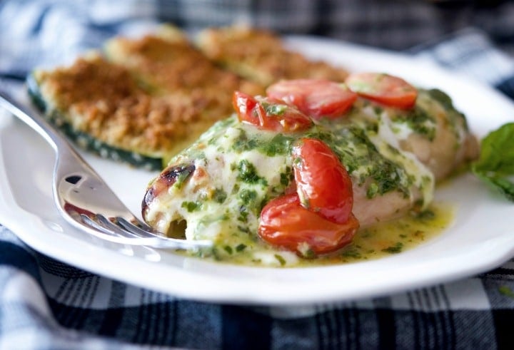 A close up of a plate of food with Chicken Margherita