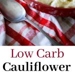 A bowl of low carb cauliflower picnic salad on a table 