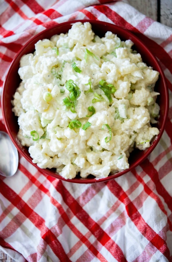 If you like potato salad during those warm weather get togethers, but can do without all of the extra added carbs, try this Low Carb Cauliflower Picnic Salad instead!