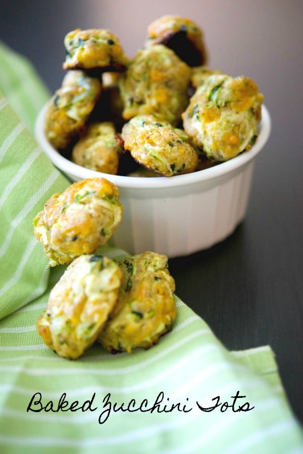 Baked Zucchini Tots made with garden fresh shredded zucchini, reduced fat shredded cheddar cheese and scallions are a healthier side dish option. 