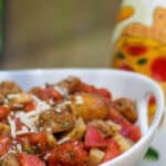 Roasted Fennel and Heirloom Tomato Panzanella Salad made with talian bread, roasted fennel and Heirloom tomatoes in a Balsamic Vinaigrette. 