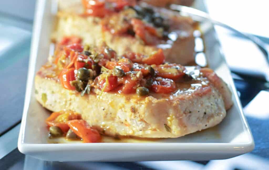 Pork with tomatoes and capers