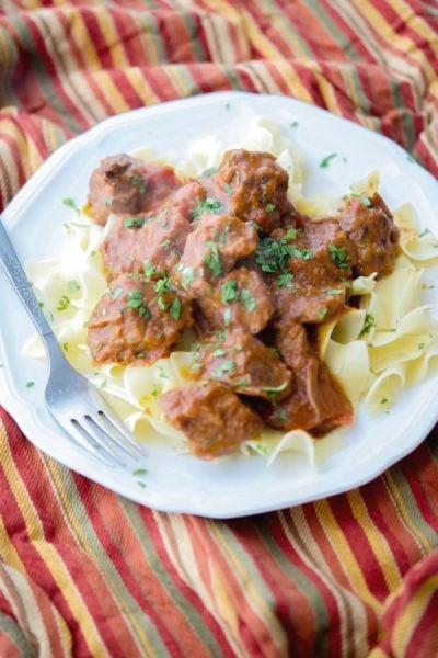 A plate of slow cooker taco beef on a table