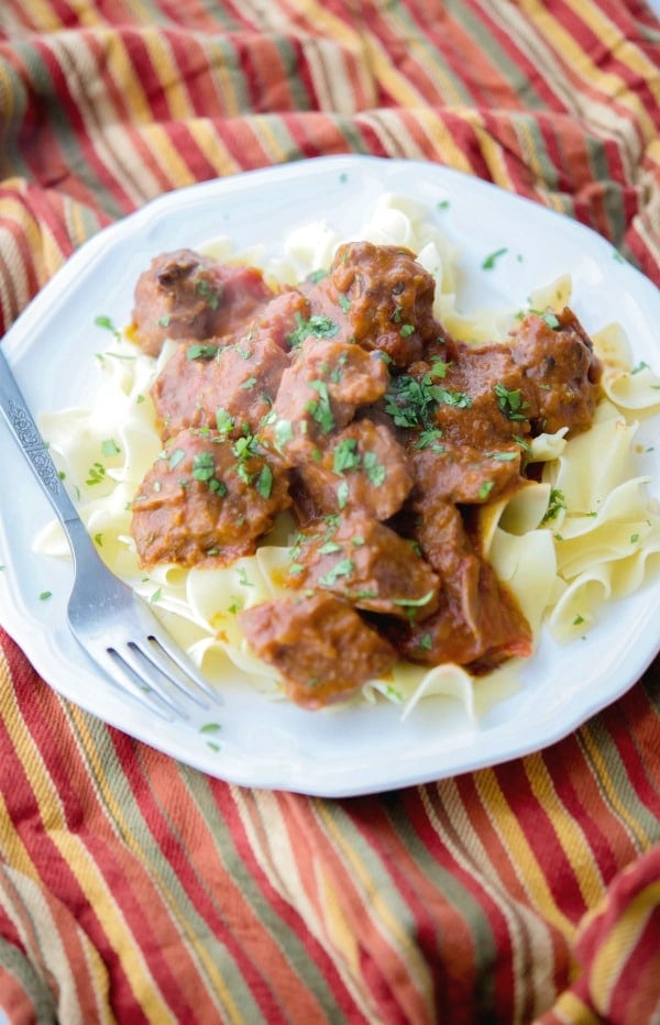 A plate of slow cooker taco beef on a table