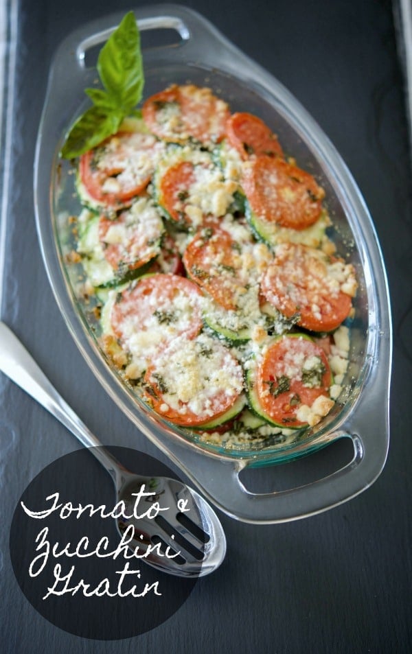 A bowl of tomato and zucchini gratin on a table