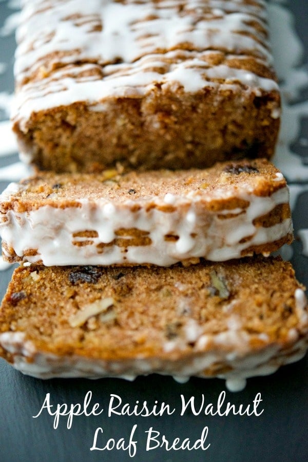 A piece of cake on a plate, with Apple and Raisin