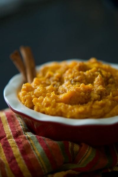 Sweet potatoes mashed until rich and creamy with Crown Royal whiskey, butter, milk, brown sugar, and cinnamon. It's a family staple on our Thanksgiving table.