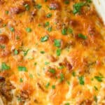 Moussaka  is casserole dish made with layers of potatoes, eggplant and ground beef; then topped with a cheesy Bechamel sauce.