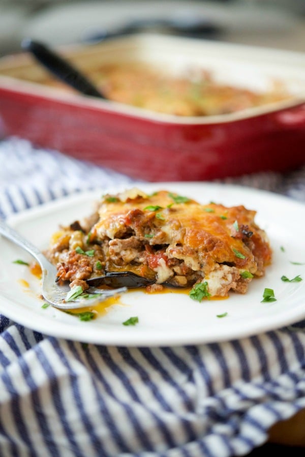 A plate of food on a table, with Moussaka and Casserole