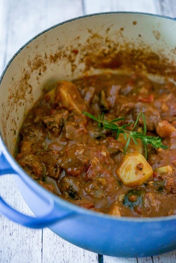 Beef stew made with zucchini, garlic, onions, fire roasted tomatoes, fresh rosemary, horseradish and red wine is unbelievably delicious.