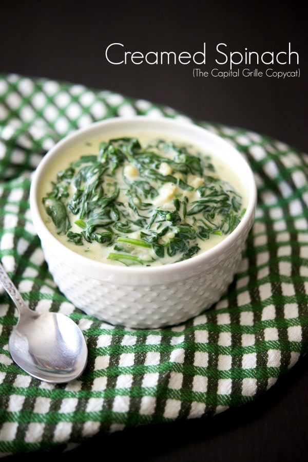 Creamed Spinach in a white bowl. 