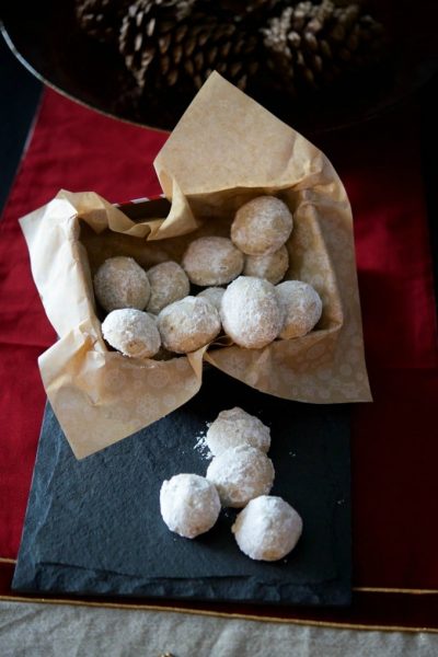 Pecan Snowball cookies in a tin.