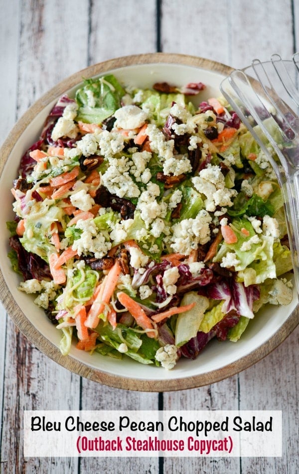 Make Outback Steakhouse's Bleu Cheese Pecan Chopped Salad at home with mixed greens and cinnamon pecans tossed in a Bleu cheese vinaigrette; then topped with crumbled Blue Cheese.  #salad #bleucheese #choppedsalad #outbacksteakhouse #copycatrecipe