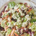 Outback Steakhouse Copycat Bleu Cheese Pecan Chopped Salad made with mixed greens & cinnamon pecans tossed in a Bleu cheese vinaigrette.