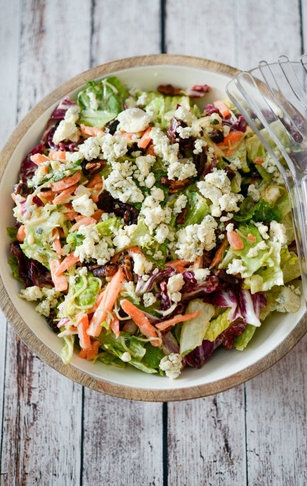 Bleu cheese chopped salad in a wooden bowl. 