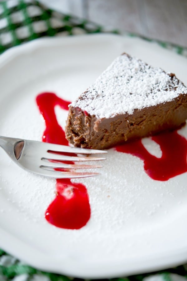 A piece of chocolate cake on a plate, with Chocolate espresso cake