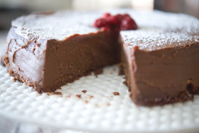 A close up of a piece of chocolate cake on a plate, with Chocolate espresso cake