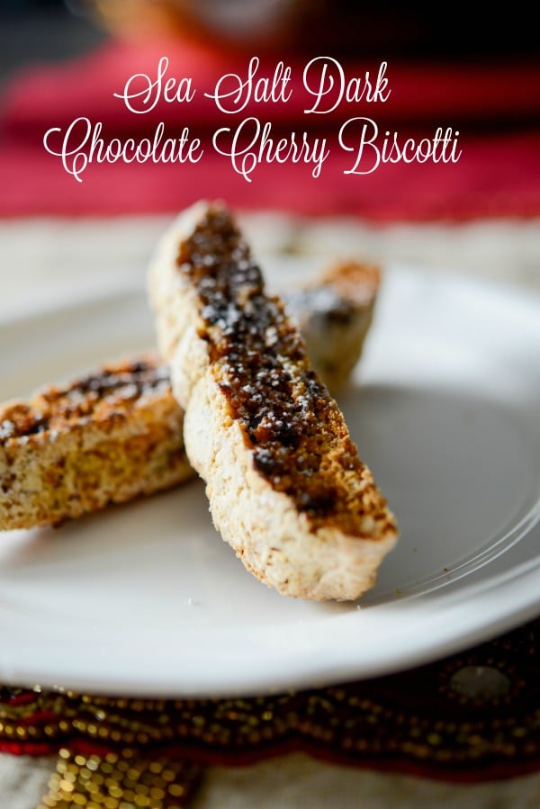 Sea salt dark chocolate cherry biscotti on a plate close up.