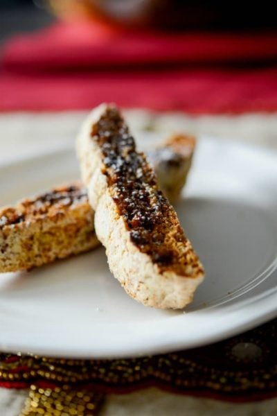 Sea salt dark chocolate cherry biscotti on a plate.