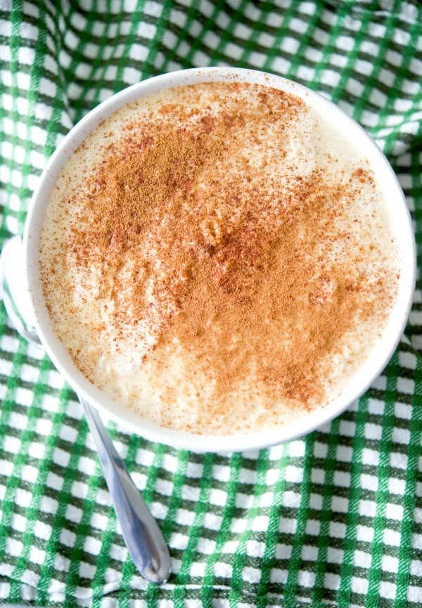 Bailey\'s Irish Cream Rice Pudding in a white bowl on top of a green napkin.