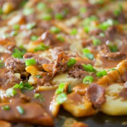 A close up of food of Blarney Fries on a sheet pan.