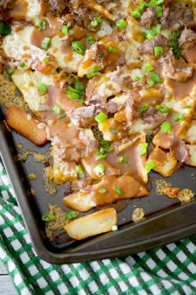 Blarney Fries are my version of an Irish Poutine made with steak cut french fries, Irish Dubliner cheese, shaved roast beef; then topped with brown gravy.
