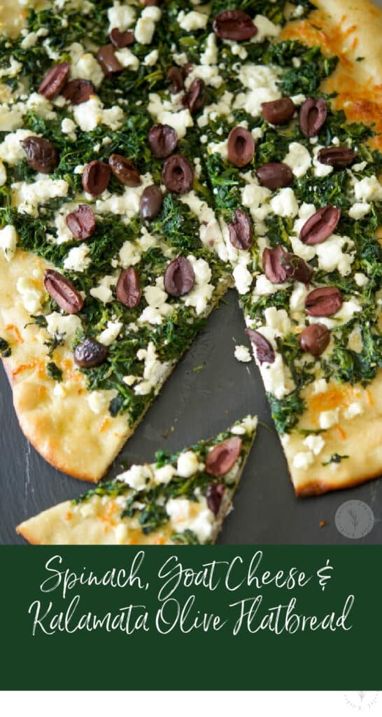 Spinach, Goat Cheese & Kalamata Olive Flatbread whole with a slice cut out