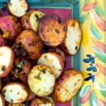 Gremolata Roasted Potatoes made with red bliss baby potatoes tossed with parsley, garlic, lemon and extra virgin olive oil. 