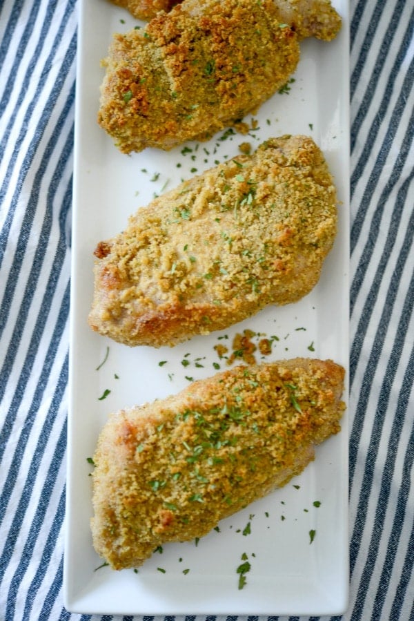 Baked Italian Breaded Pork Chops on a white plate. 