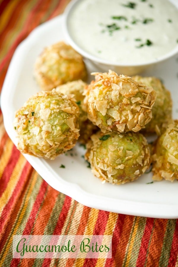 Guacamole Bites made with avocados, lime juice, tomatoes, onions and cilantro. 