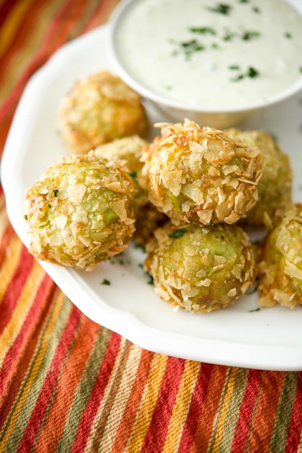 Guacamole Bites on a plate with dipping sauce. 