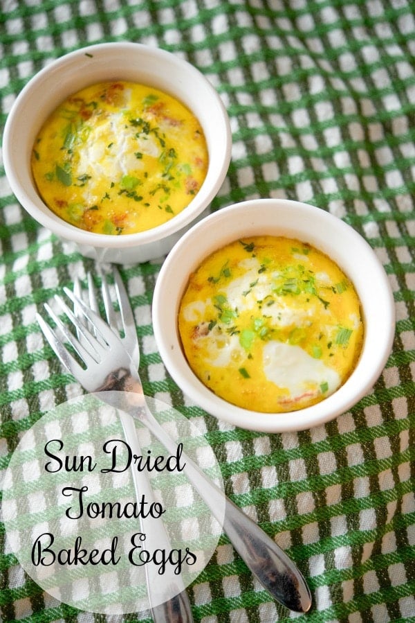 Baked eggs in white dishes. 