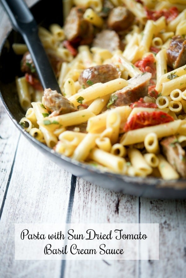 A close up of Pasta with Sun Dried Tomato Basil Cream Sauce in a skillet.