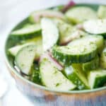 a bowl of sliced cucumbers
