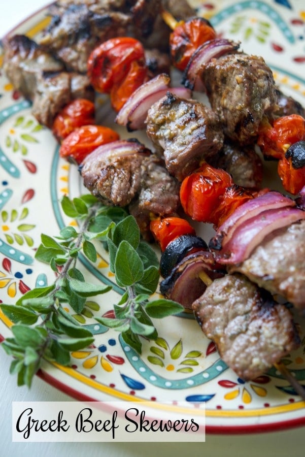 Greek Beef Skewers made with cubed London broil steak marinated in lemon juice, fresh oregano, garlic and light olive oil.