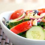 Plump juicy tomatoes, crisp English cucumbers, Kalamata olives, red onion and Feta cheese make this tasty iconic Greek Salad.