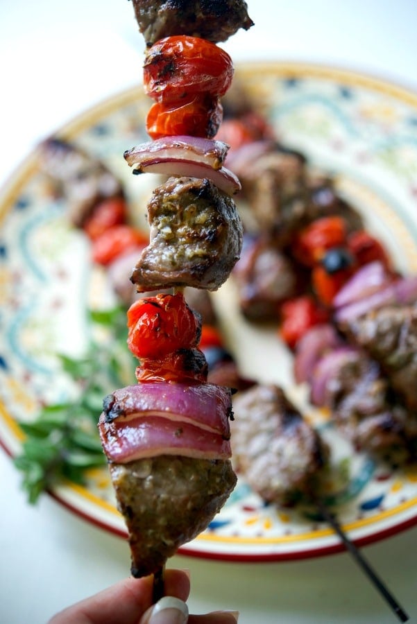 Greek Beef Skewers made with cubed London broil steak marinated in lemon juice, fresh oregano, garlic and light olive oil. 