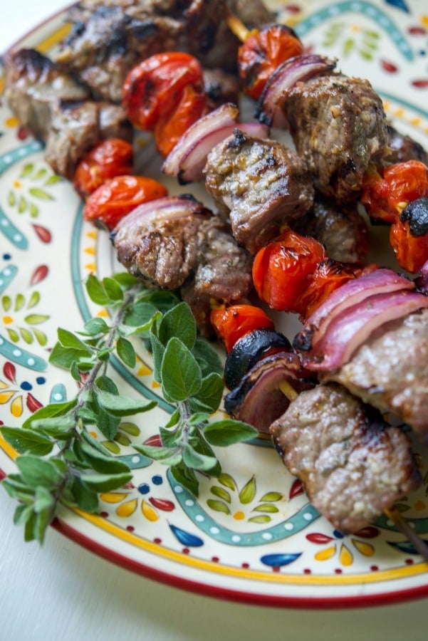 Greek Beef Skewers made with cubed London broil steak marinated in lemon juice, fresh oregano, garlic and light olive oil. 