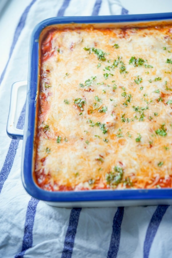 Zucchini Lasagna with a melted cheese top in a dish. 