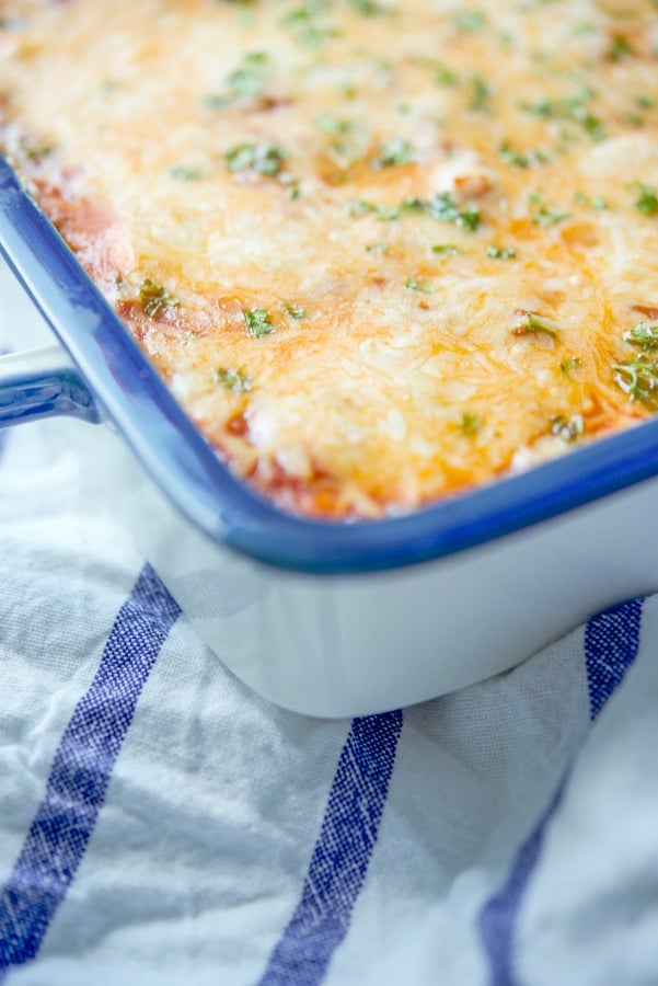 Zucchini Lasagna in a blue and white baking dish. 