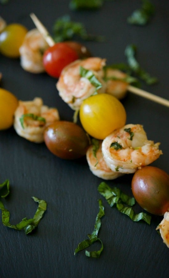 Lemon basil shrimp on skewers with tomatoes