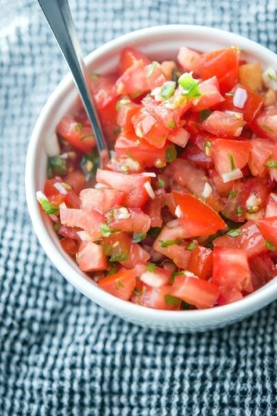 Pico de Gallo; a cold Mexican dip made with fresh tomatoes, onions, cilantro, jalepeno peppers and lime juice is deliciously refreshing.