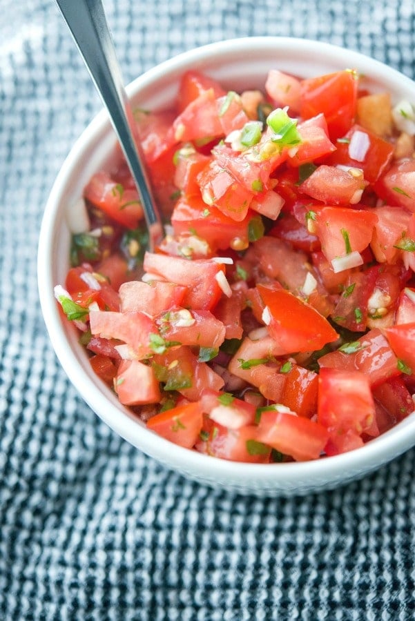 Pico de Gallo; a cold Mexican dip made with fresh tomatoes, onions, cilantro, jalepeno peppers and lime juice is deliciously refreshing. 